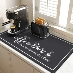 Findosom dish drying mat with coffee-bar design soaks spills quickly on countertops.