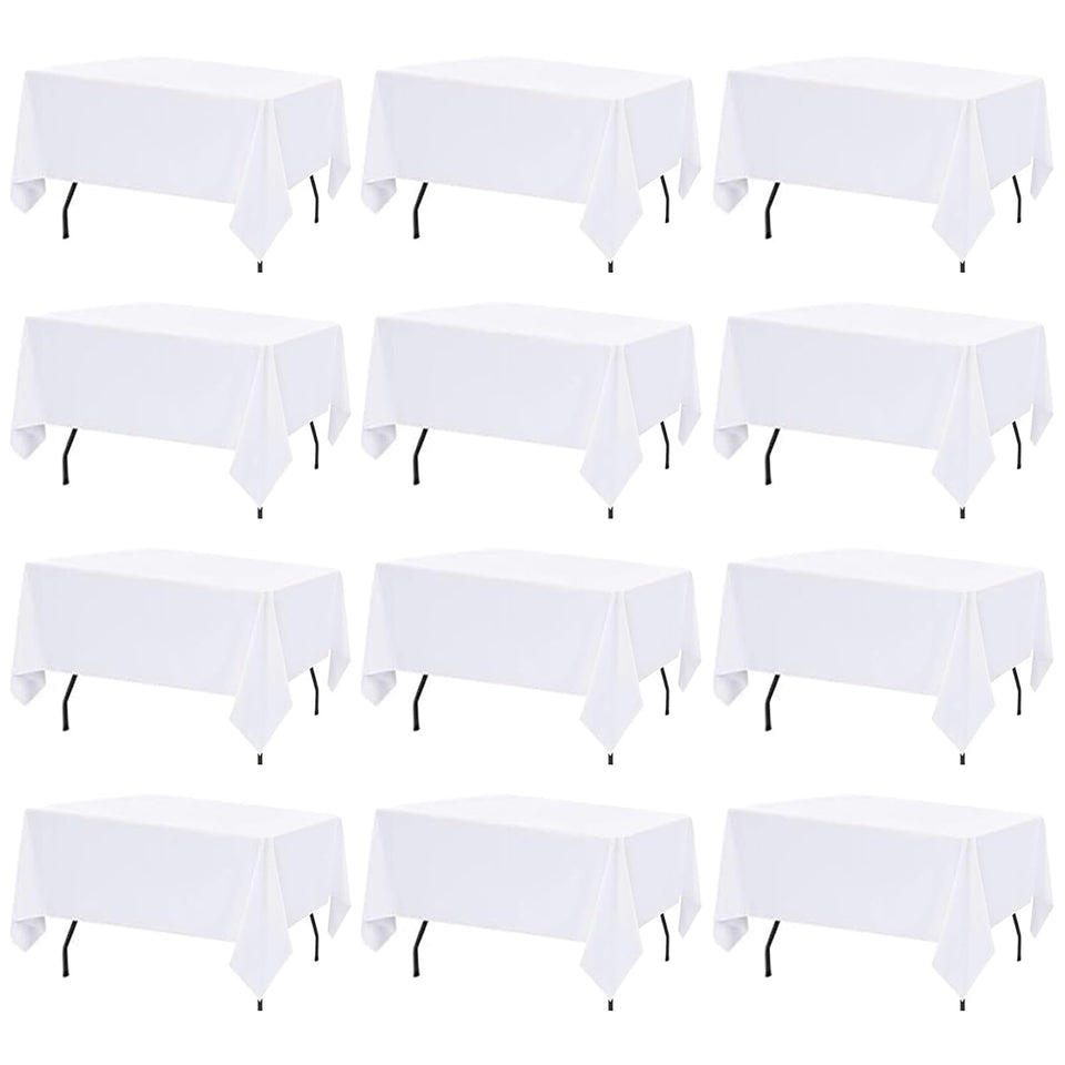 FINDYOU 12-pack white tablecloth on a 60x102 inch table for elegant events.