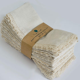 FINGERCRAFT dinner napkins with ivory lace and mitered corners for elegant table styling.