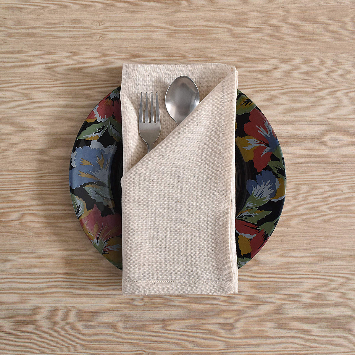 Fingercraft 20x20 ivory napkins in a ready-to-use dining setup