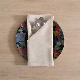 Fingercraft 20x20 ivory napkins in a ready-to-use dining setup