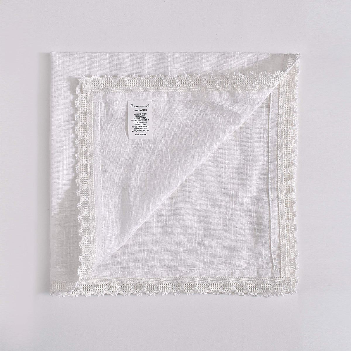 FINGERCRAFT lace detail napkin, creates a refined, timeless table presentation