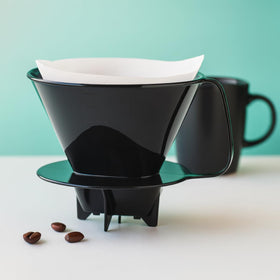 Fino cone supports disposable or reusable filters for flexible brewing.