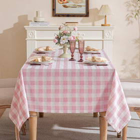 Fiokle tablecloth draped over a rectangular table showcases elegant coverage.