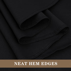 Fitable black tablecloth on a six-foot table for events.