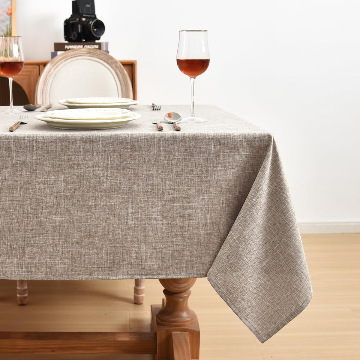 Fitable faux linen tablecloth dining setup showcases neutral tone for any event.