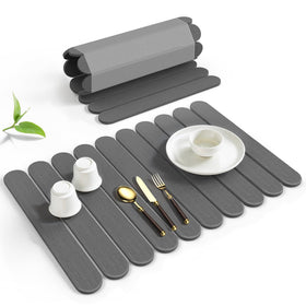 Fitnice large stone drying mat on counter showing space-saving roll-up.