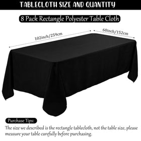 Fivenl black tablecloth draped on a 6-ft table for polished dining
