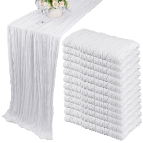 Fivenl cheesecloth table runner on table for rustic wedding ambience