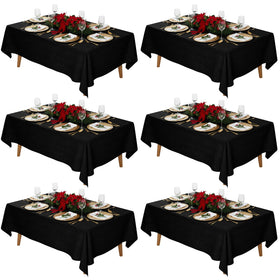 Fixwal 6-pack black rectangle tablecloth on a table for elegant events