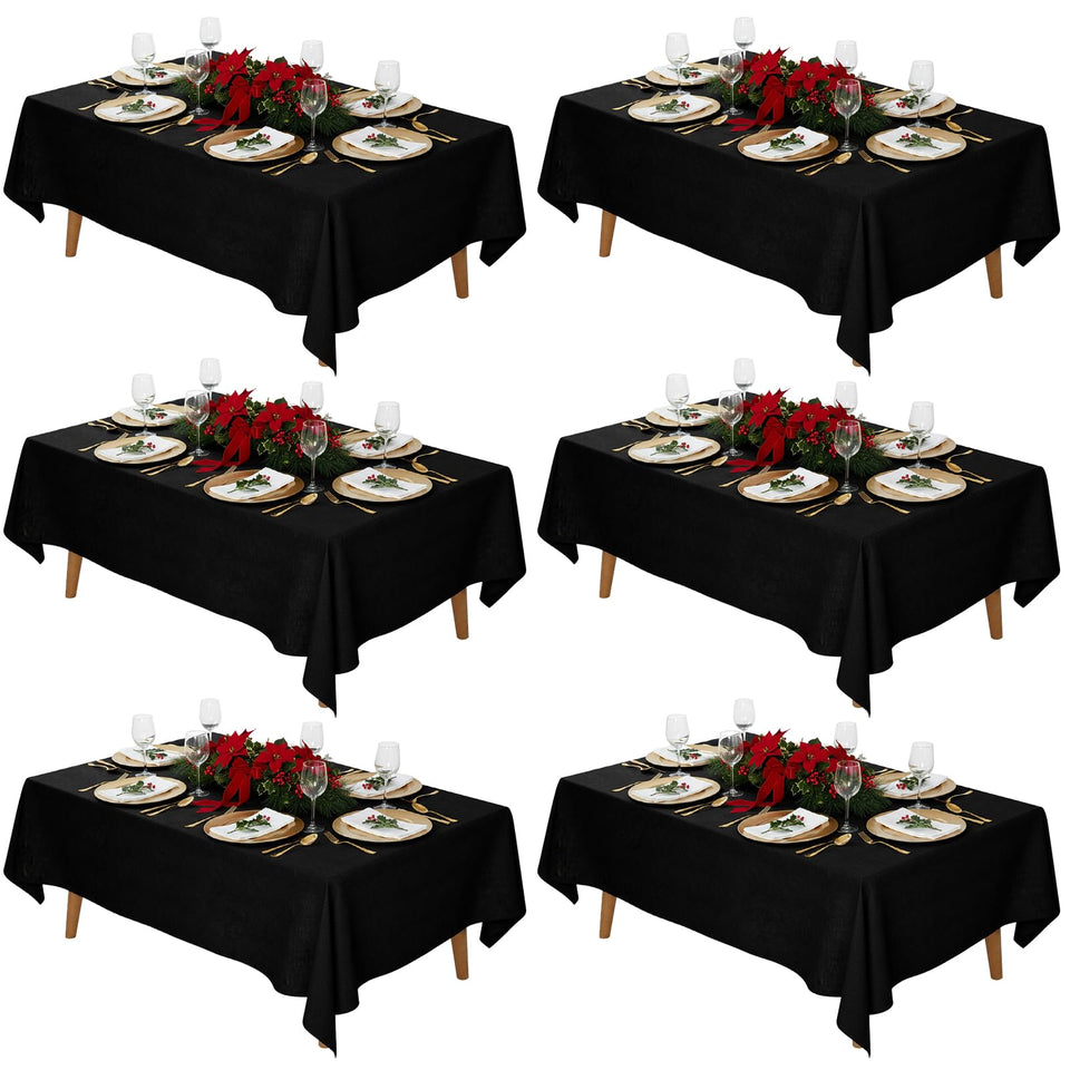 Fixwal 6-pack black rectangle tablecloth on a table for elegant events