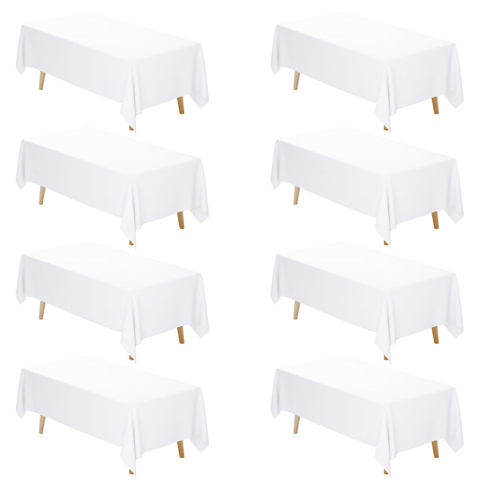 Fixwal 8-pack white tablecloth on a 6ft rectangle table protecting from dust and scratches.
