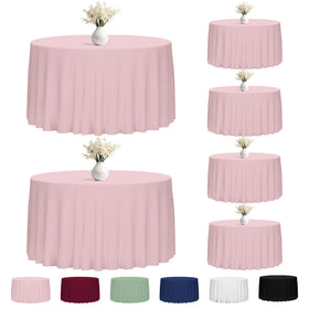 Fixwal pink round 120-inch tablecloth on a formal dining table for wedding decor
