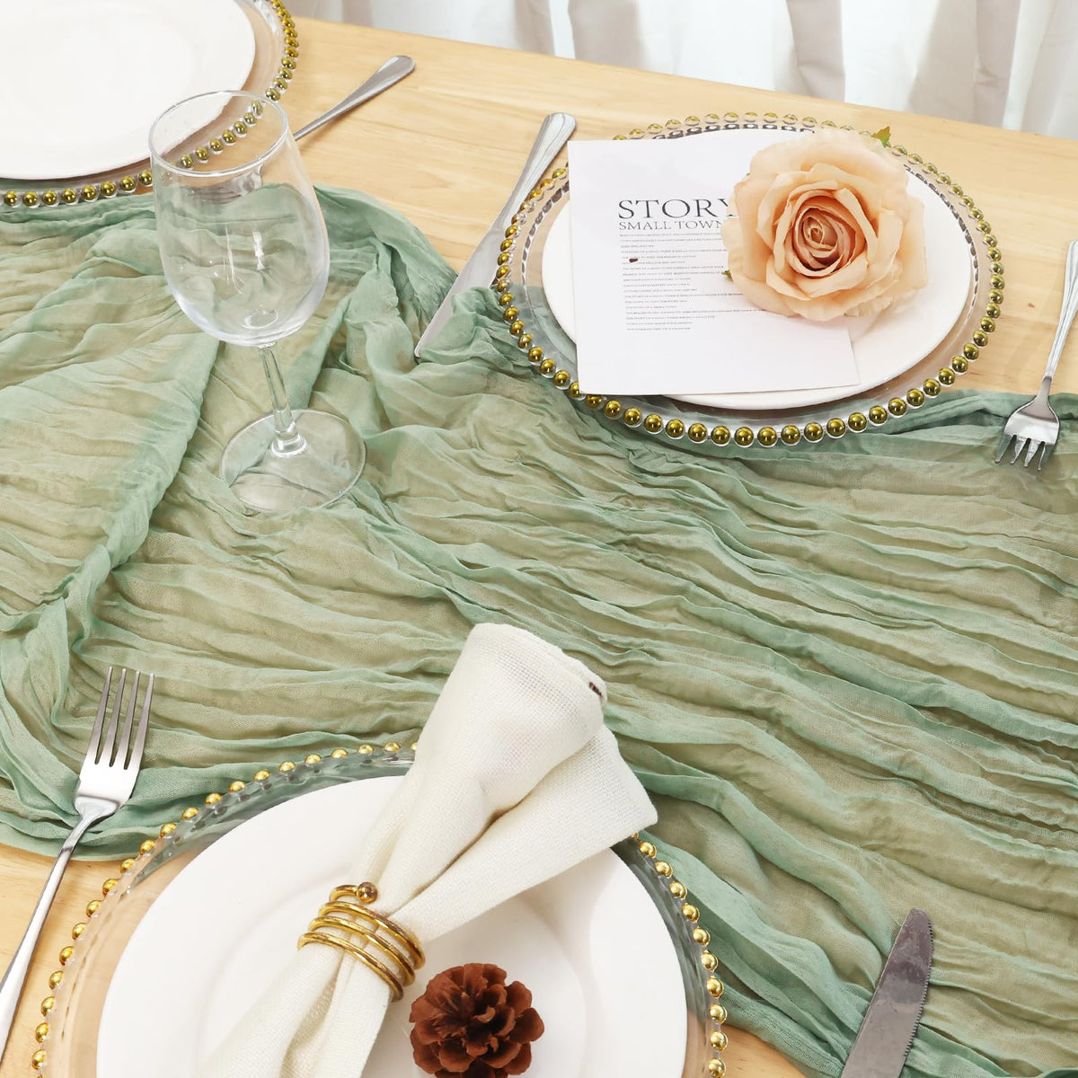 Sage green Fixwal runner folds for versatile displays on various tables