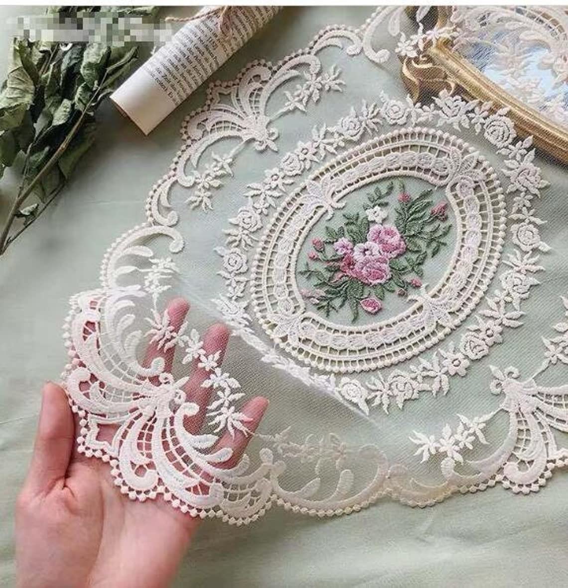 Fiygor 8-pack retro lace placemats with an oval floral pattern add elegant dining decor.