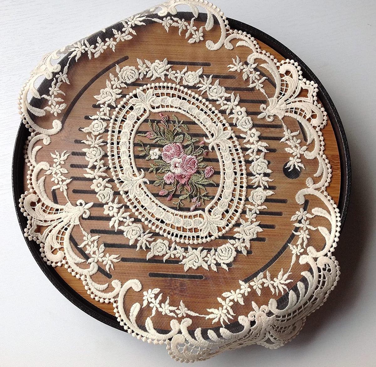 Fiygor cotton-organza embroidery on beige linens adds refined texture.