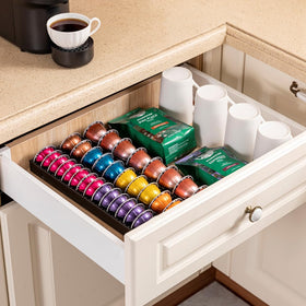 FlagShip Vertuo Pod Drawer black coating surface signals long-lasting finish.