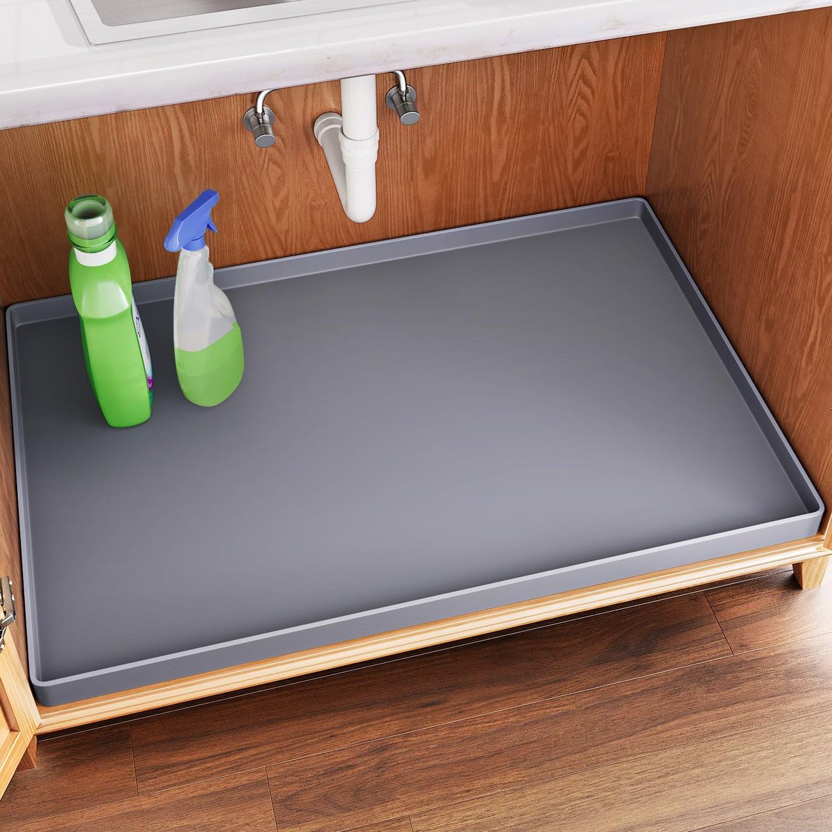 FLATO under-sink mat with edge design protects cabinets from leaks.