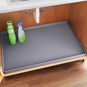 FLATO under-sink mat with edge design protects cabinets from leaks.