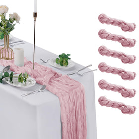 flohar pink cheesecloth table runner on table for romantic wedding decor