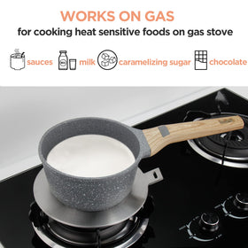 Flovia Cook by Nature adapter plate in use on gas hob delivering even heat transfer.