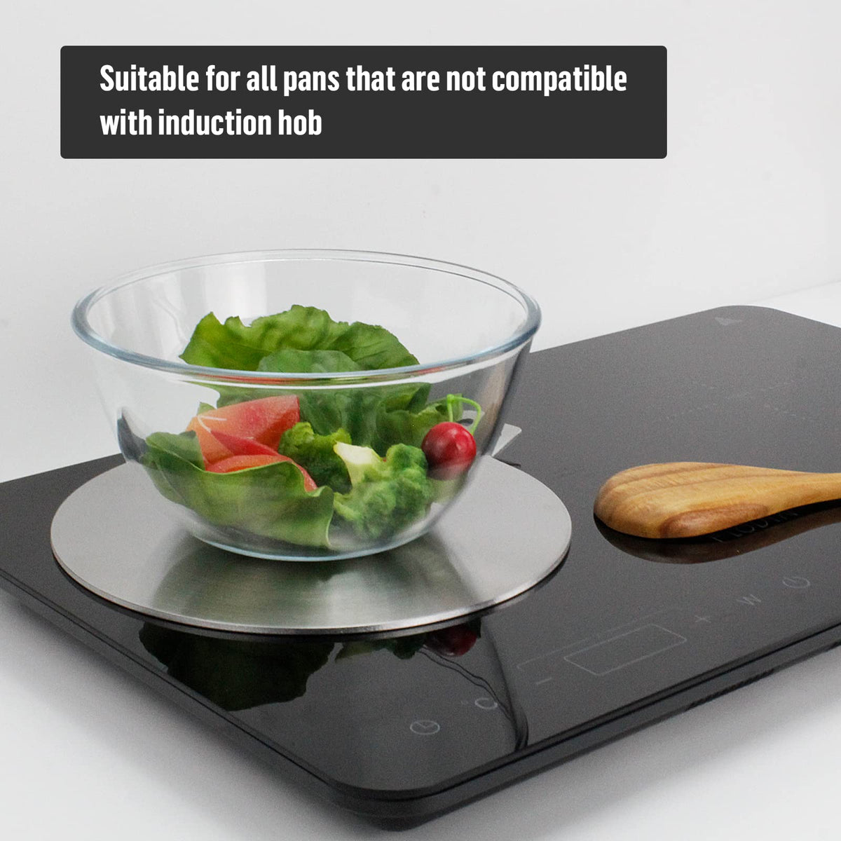 Flovia Cook by Nature heat diffuser on induction hob for non-induction pans.