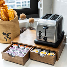 FLYIEE wood coffee maker stand elevates the brewer while saving counter space.