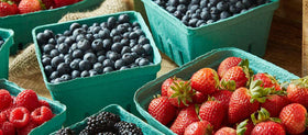 FMP Brands green berry basket complements store signage and elevates display appeal.