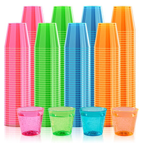FOCUSLINE 300Pack neon-edged 1oz shot glasses glow under blacklight for vibrant parties.