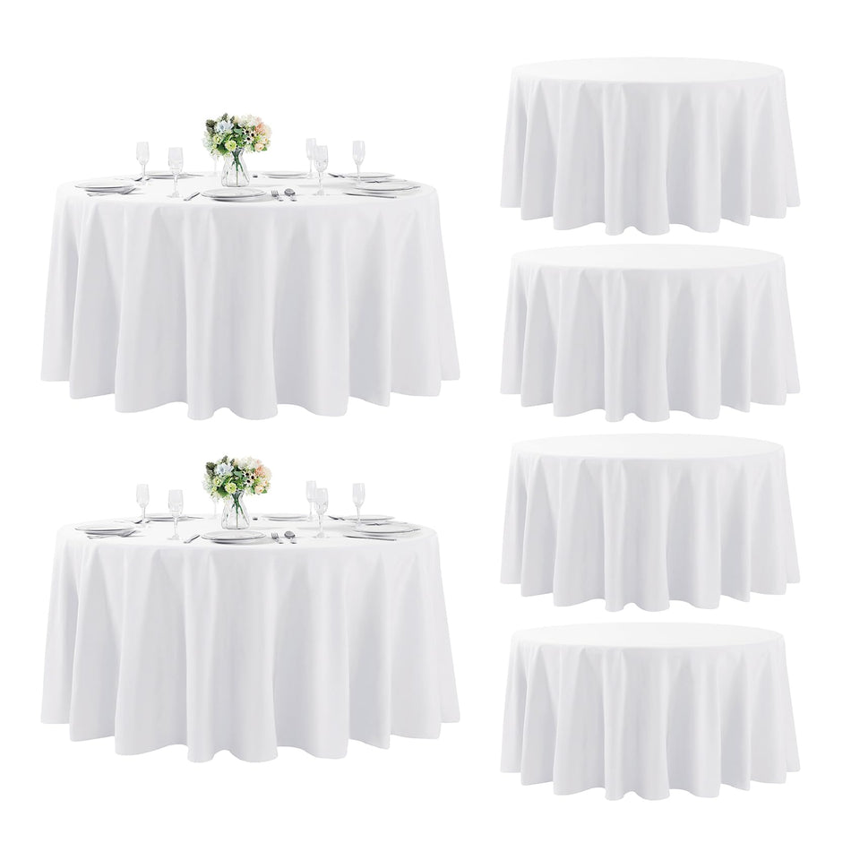 Fokitut 6-pack round tablecloth in white laid for event setup.