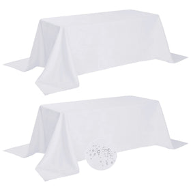 Fokitut waterproof rectangle tablecloth on a full dining table protecting the surface.