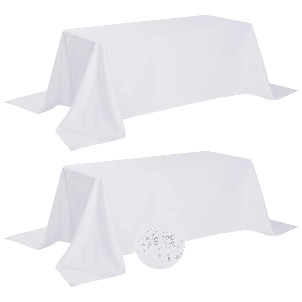 Fokitut waterproof rectangle tablecloth on a full dining table protecting the surface.