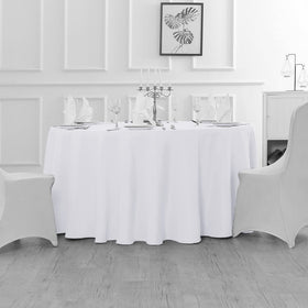 Fokitut wedding and dining setup uses round tablecloth for an elegant table.