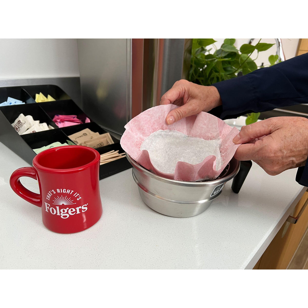 Folgers filter packs setup showing premeasured grounds for quick, consistent cups