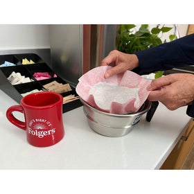Folgers filter packs setup showing premeasured grounds for quick, consistent cups