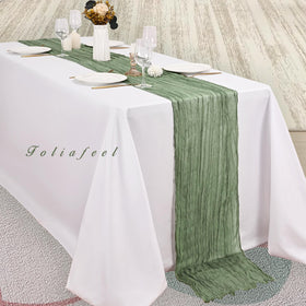 Foliafeel sage green cheesecloth table runner provides graceful drape for banquet setups