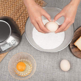 Built-in alarm timer aids precise timing while cooking