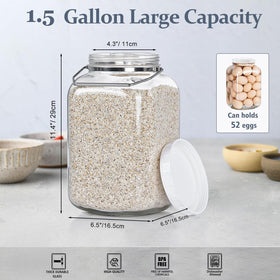Folinstall glass jar with stainless steel handle for portable storage.