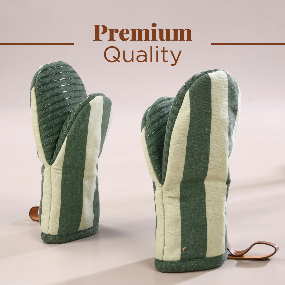 Folkulture oven mitts with hanging loop for convenient storage.