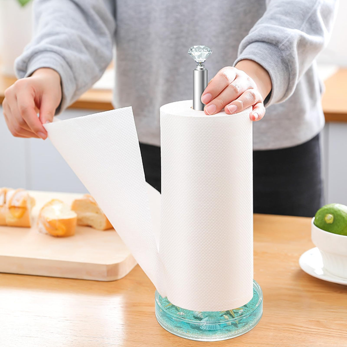 FONMY seascape blue paper towel holder enhances coastal decor and quick one-handed use.