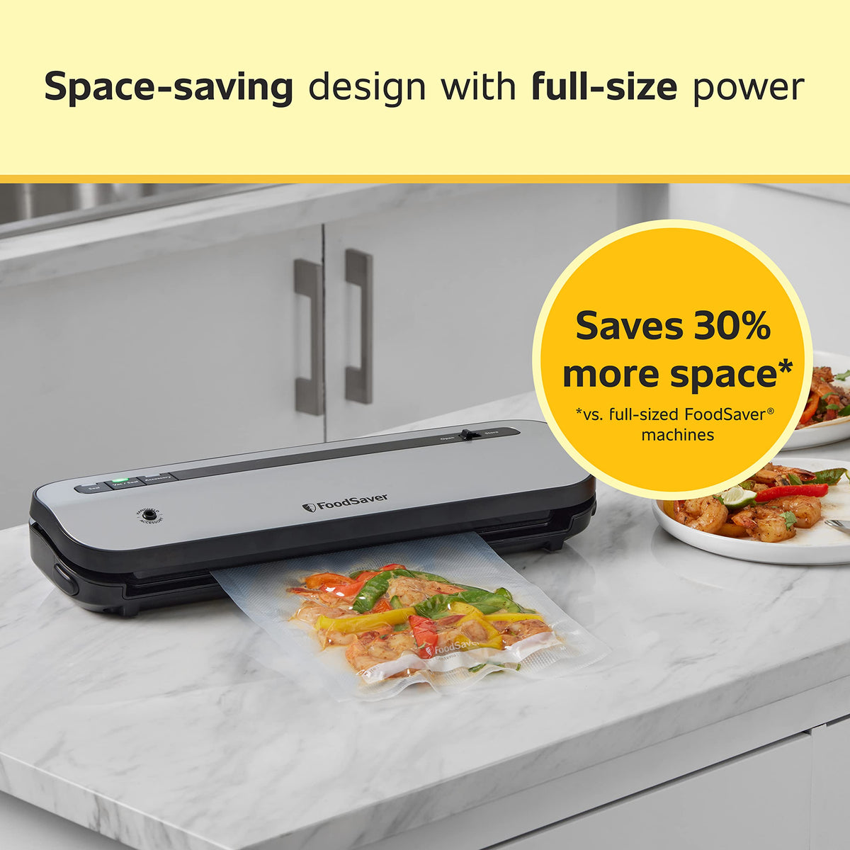 FoodSaver lid-click seal controls highlighted for secure airtight sealing.