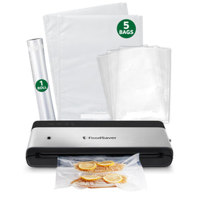FoodSaver PowerVac compact vacuum sealer in stainless steel seals freshness efficiently.