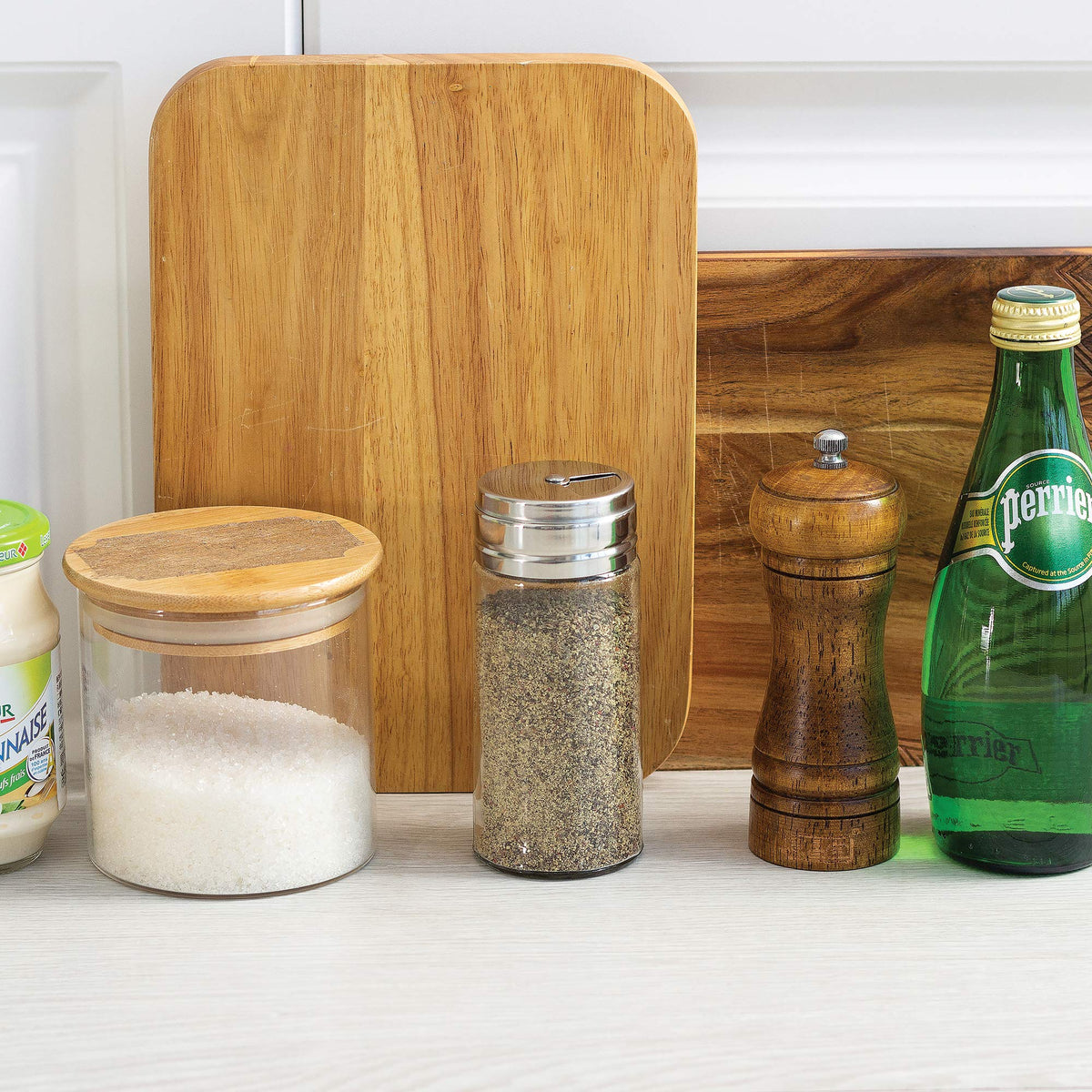 Fox Run clear jar stores salt, pepper, paprika with visible contents.