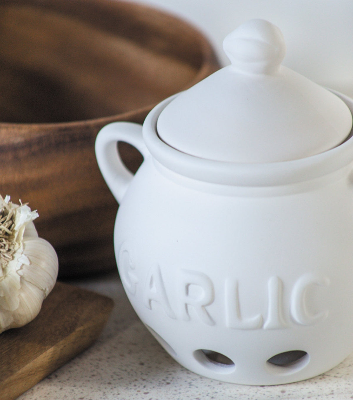Fox Run Garlic Keeper lid protects from light to extend shelf life