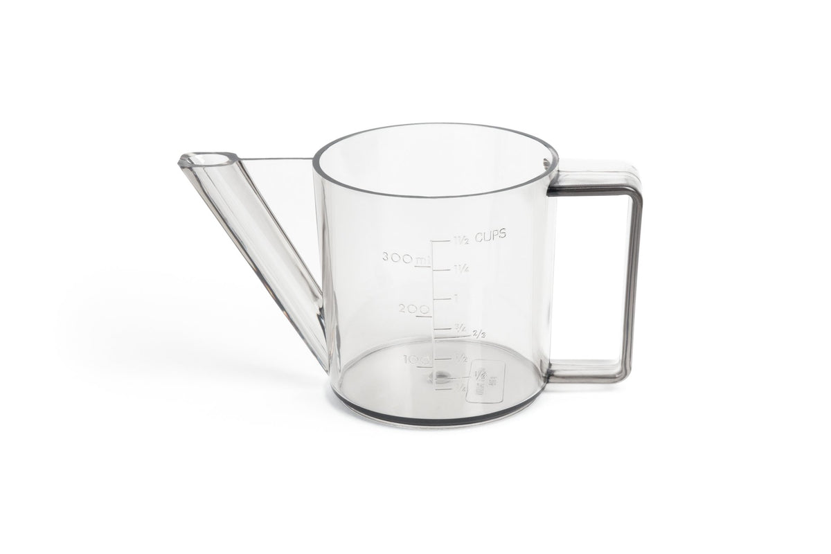 Fox Run gravy separator pour view showing leaner gravy after fat removal
