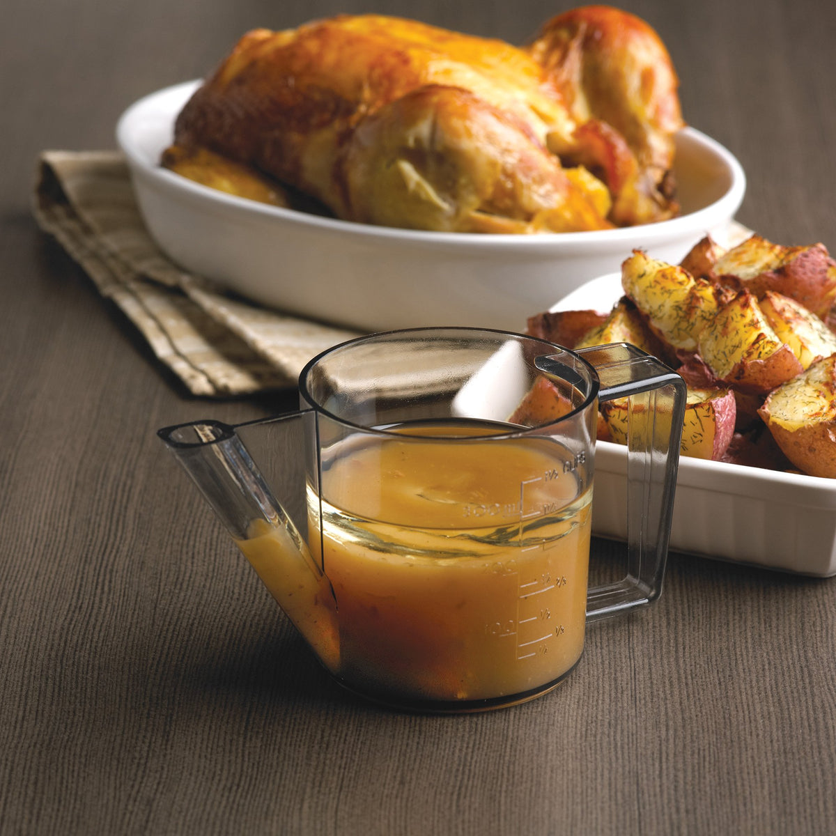 Fox Run gravy separator measuring side for precise portions