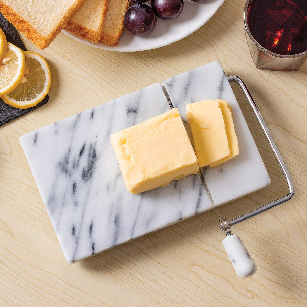 Fox Run marble cheese slicer on counter ready for service