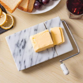 Fox Run marble cheese slicer on counter ready for service