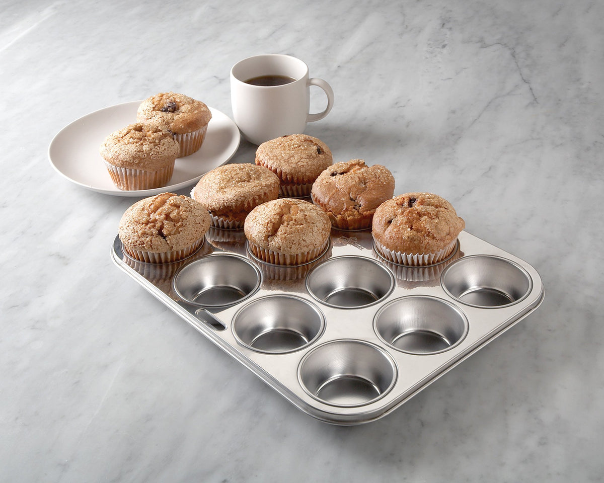 Fox Run muffin pan with liners demonstrates versatile use for cupcakes.