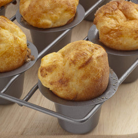Pan measures 9 by 15 inches for standard oven fit.